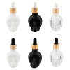 Skull Bitters Bottle In Black, White And Clear -Liquor Specialty Store SkullBitters